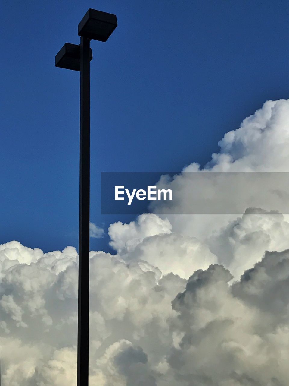 LOW ANGLE VIEW OF CLOUDS IN BLUE SKY