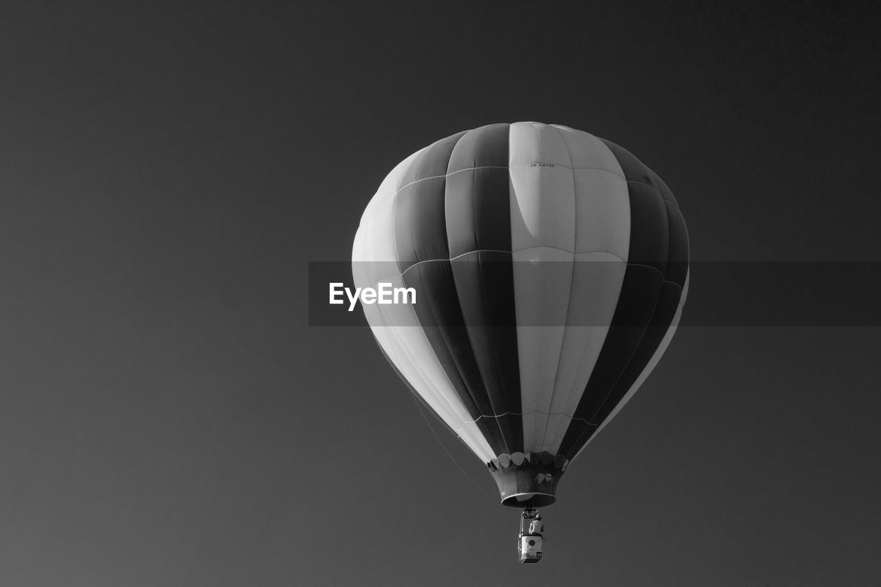 LOW ANGLE VIEW OF HOT AIR BALLOON