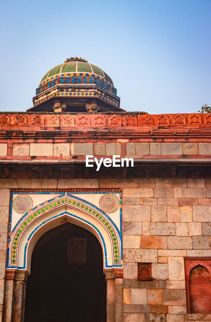 Mosque and tomb of isa khan of humayun tomb exterior view at misty morning from unique perspective