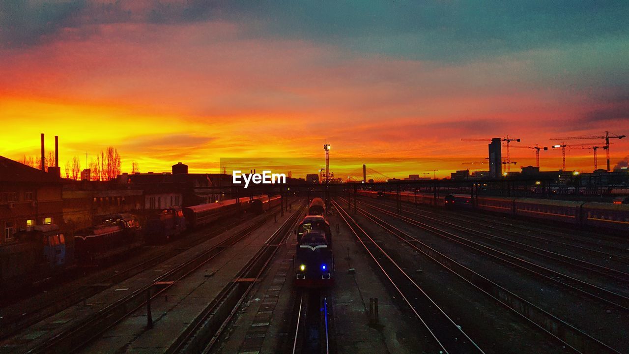 High angle view of train against sky during sunset