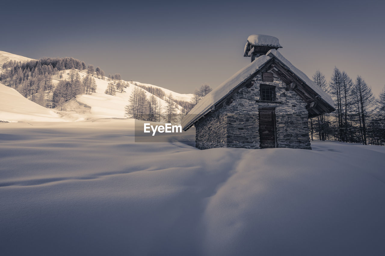 BUILDING AGAINST SKY DURING WINTER