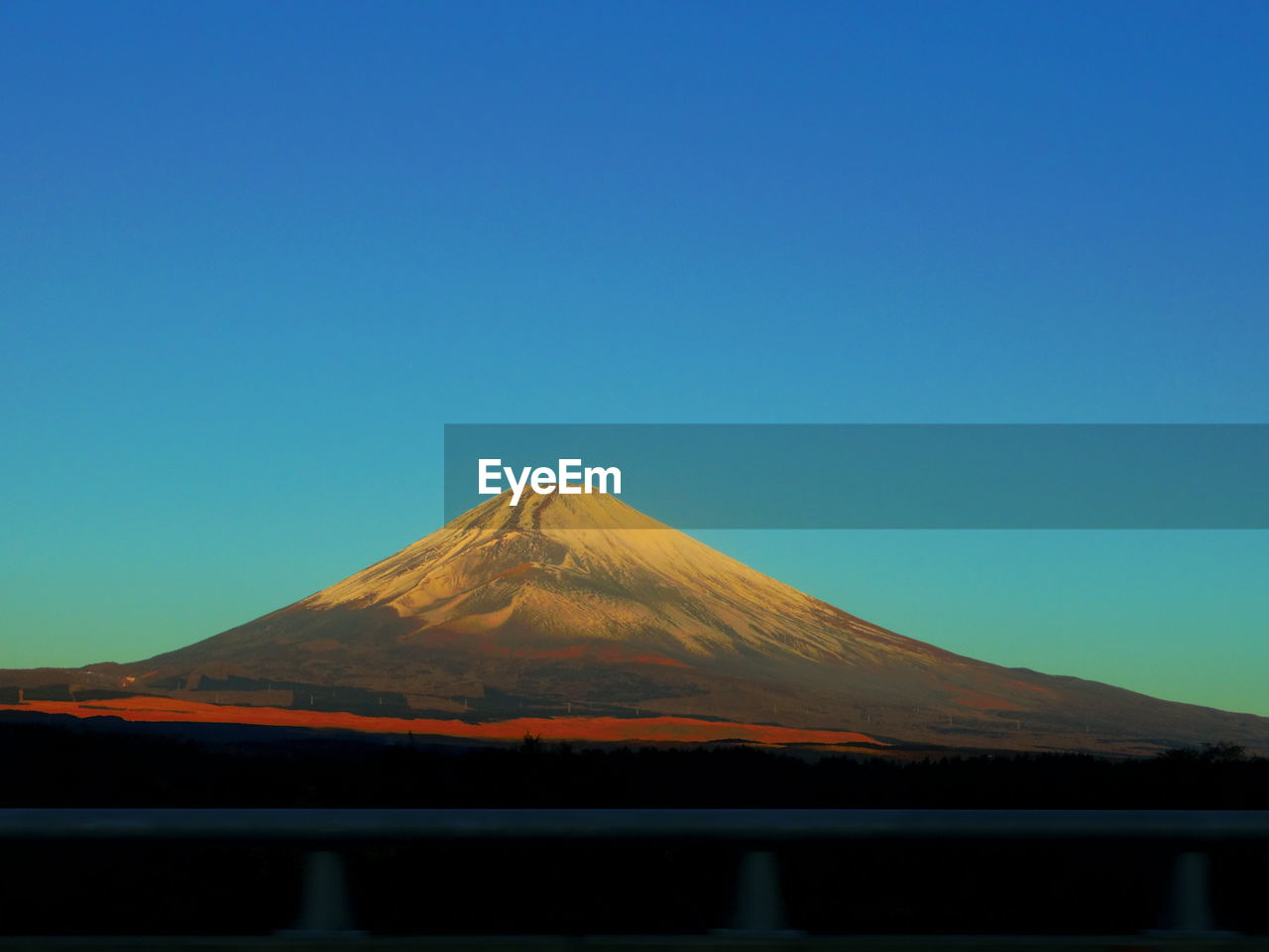 Scenic view of mt fuji against clear blue sky