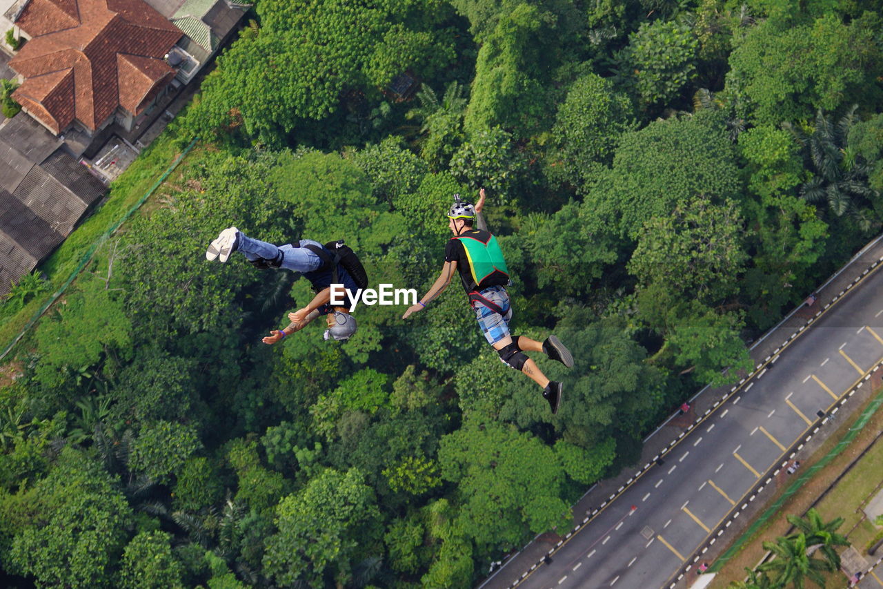 HIGH ANGLE VIEW OF WOMAN IN PARK