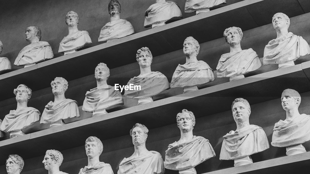 Low angle view of statues in shelves