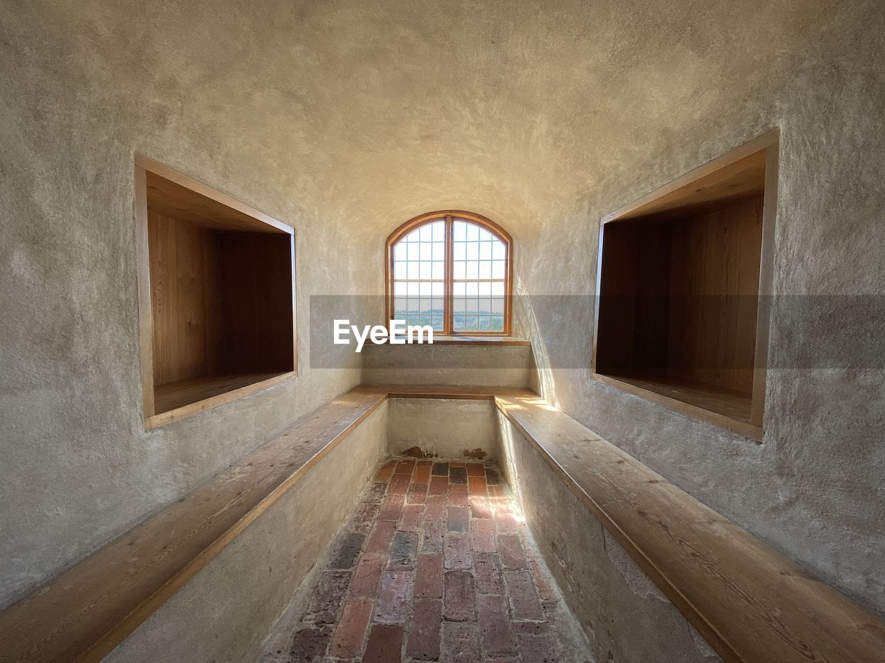 Empty corridor of medieval castle tower 