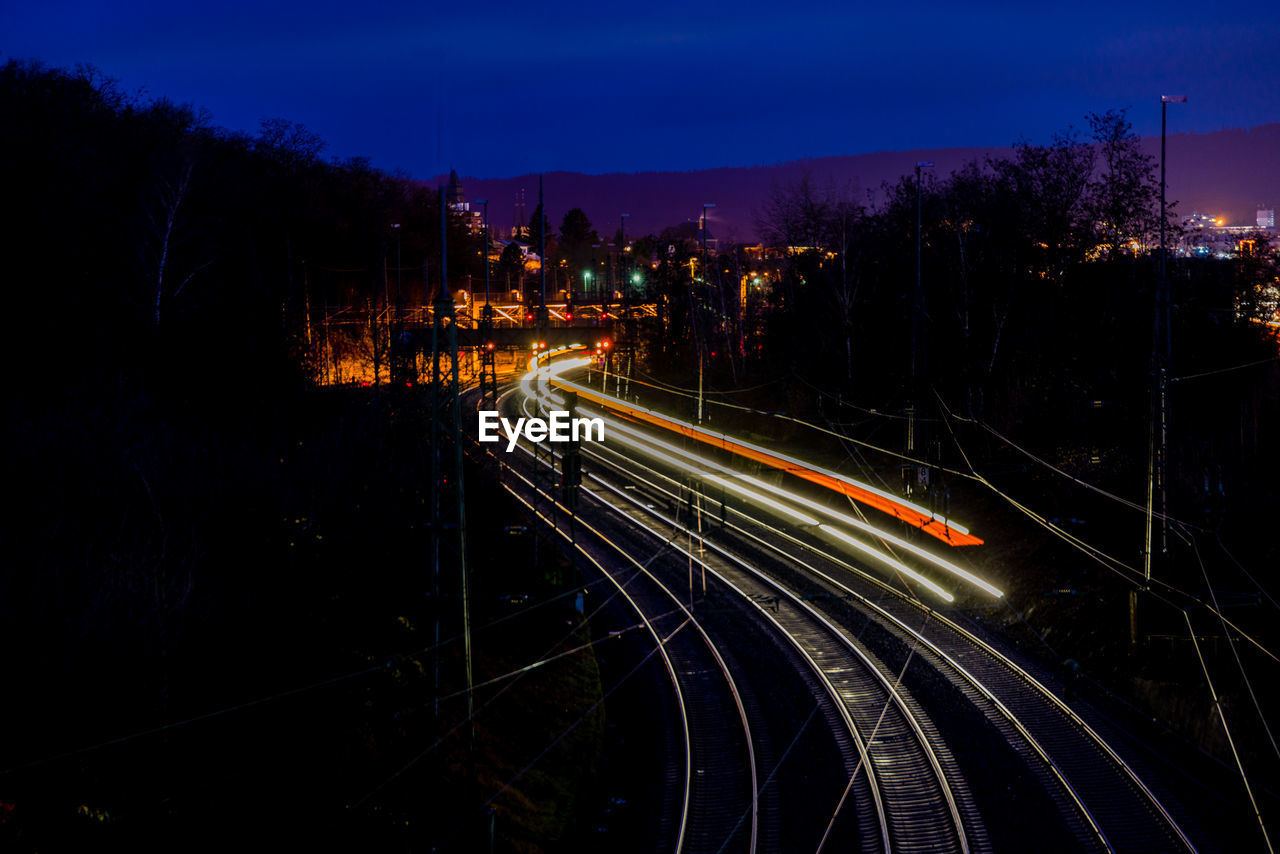 High angle view of light trails on street at night