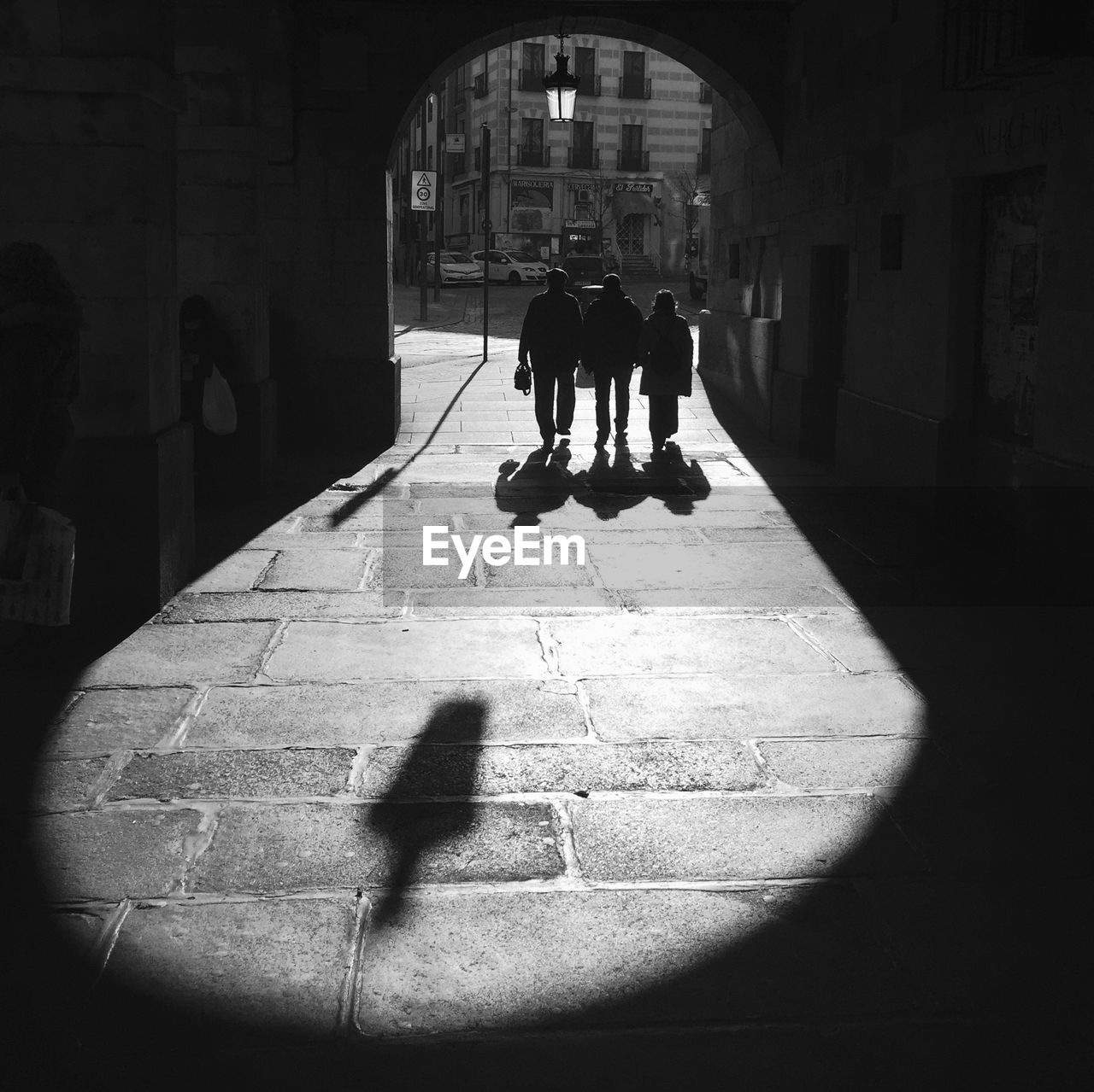 People walking on street during sunny day