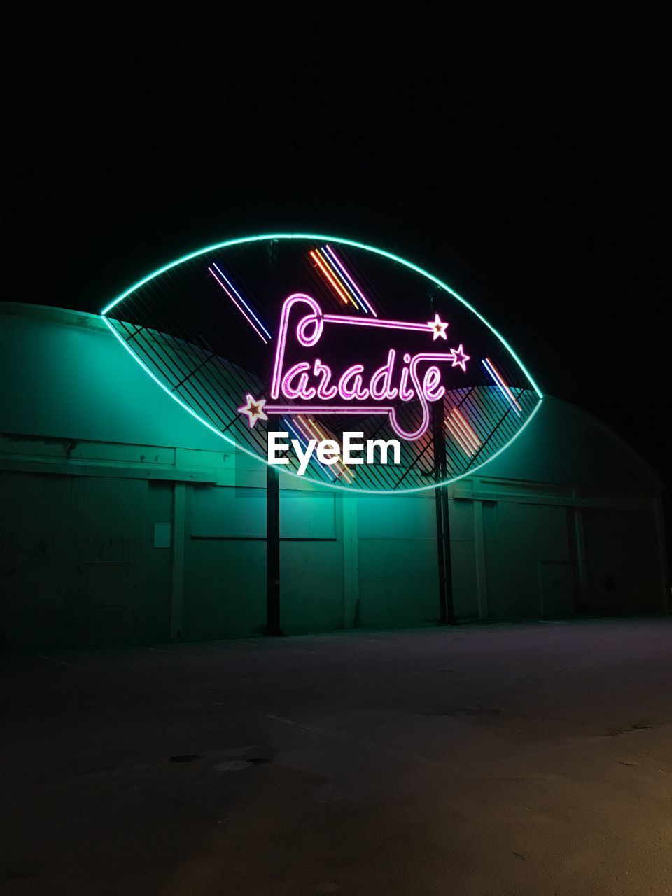 ROAD SIGN AT NIGHT