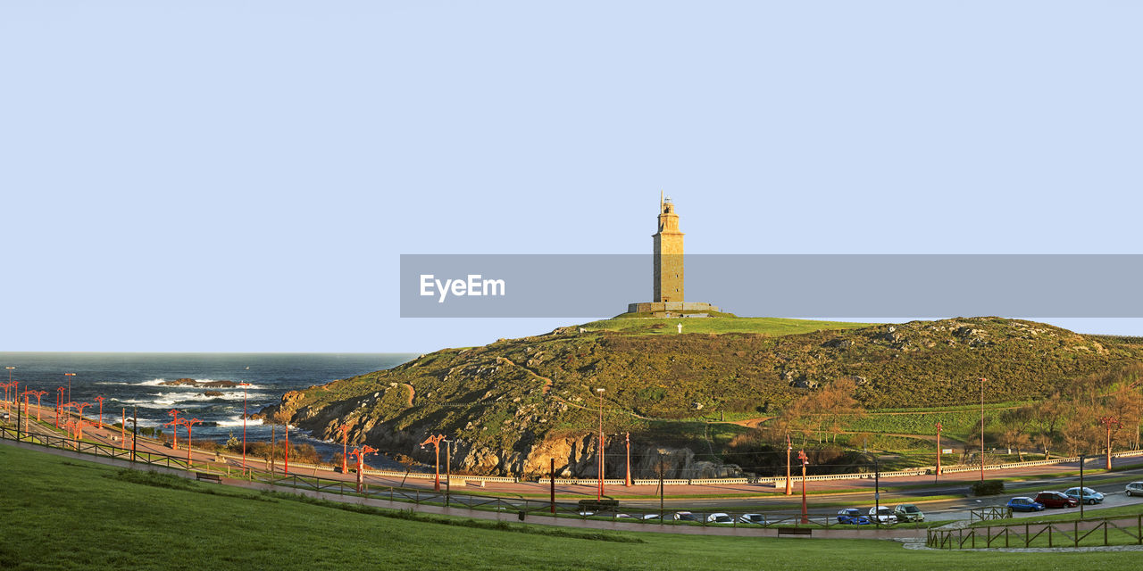 Tower of hercules against clear blue sky