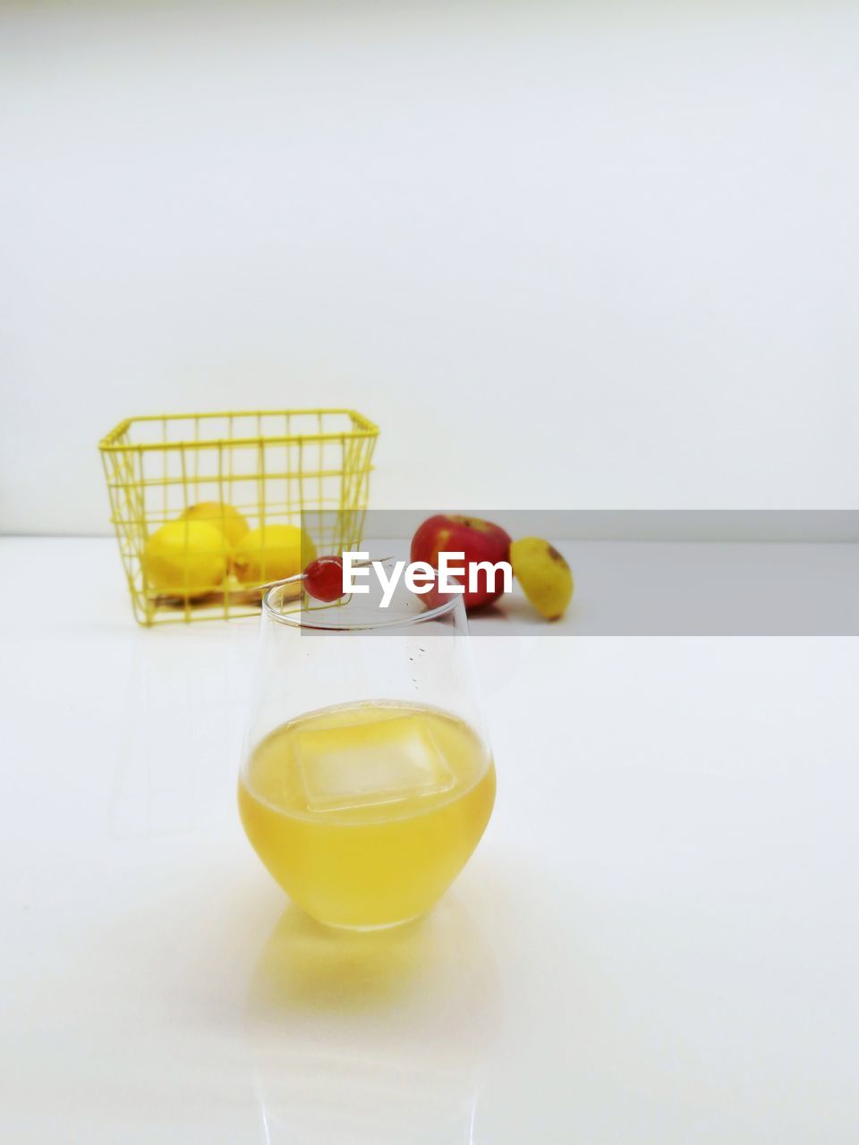 CLOSE-UP OF YELLOW FRUITS ON TABLE