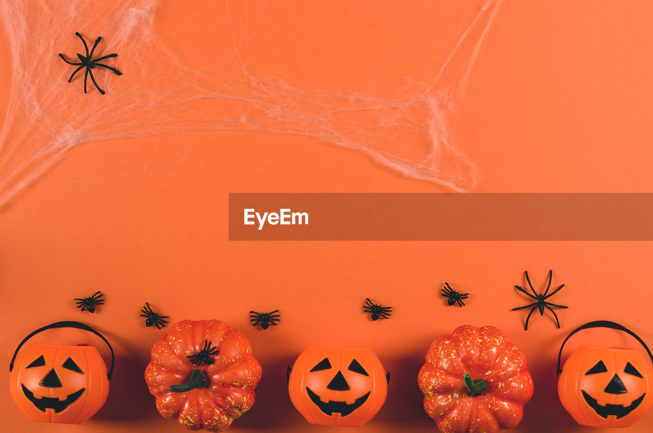 Decorations for halloween on an orange background, copy space. halloween party.