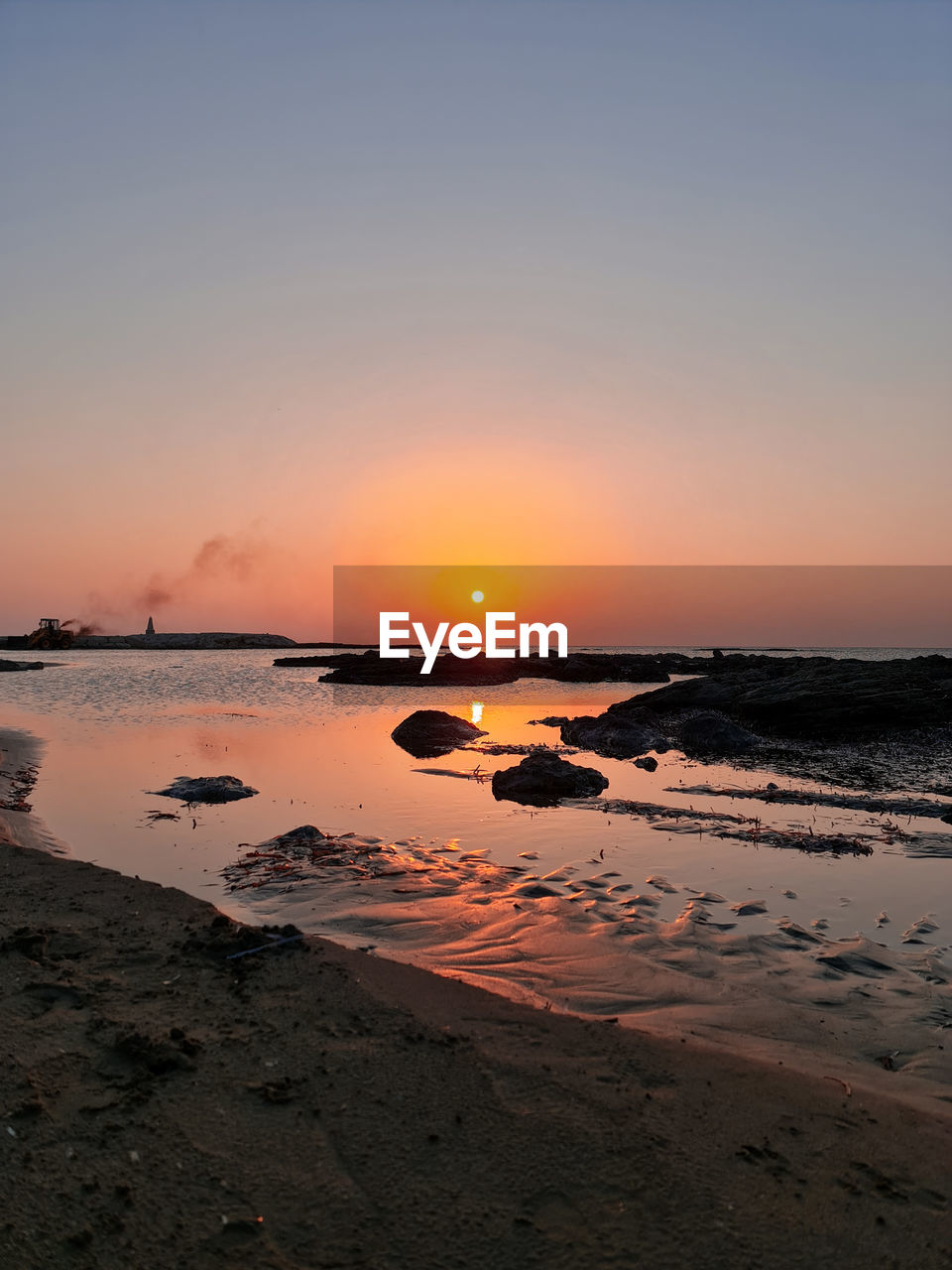 SCENIC VIEW OF SEA DURING SUNSET