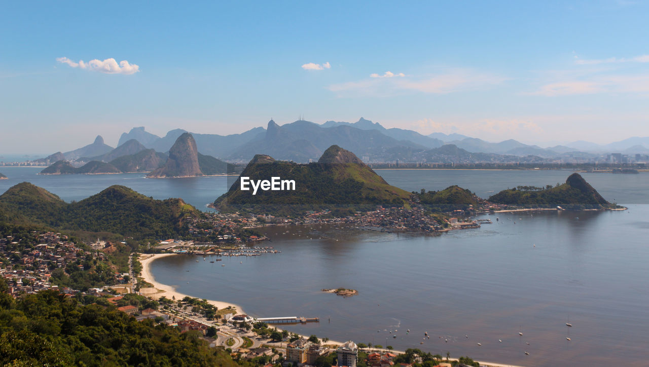 Scenic view of sea and mountains against sky. rio de janeiro.