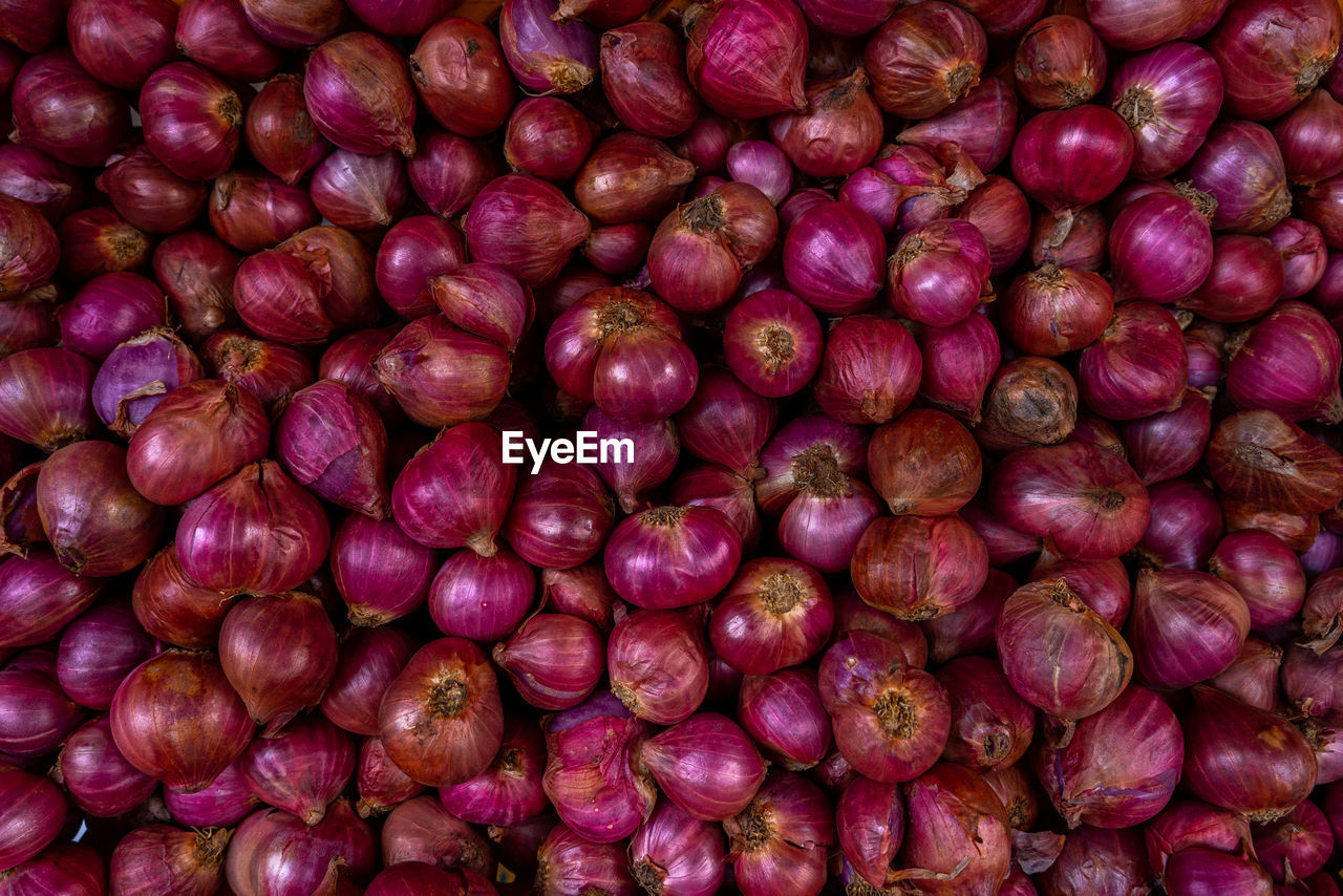 Full frame shot of onions flat lay