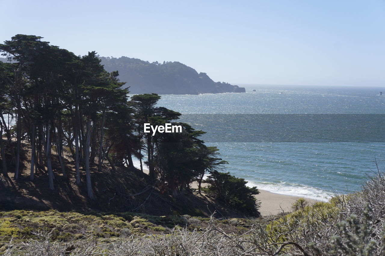 Scenic view of sea against clear sky