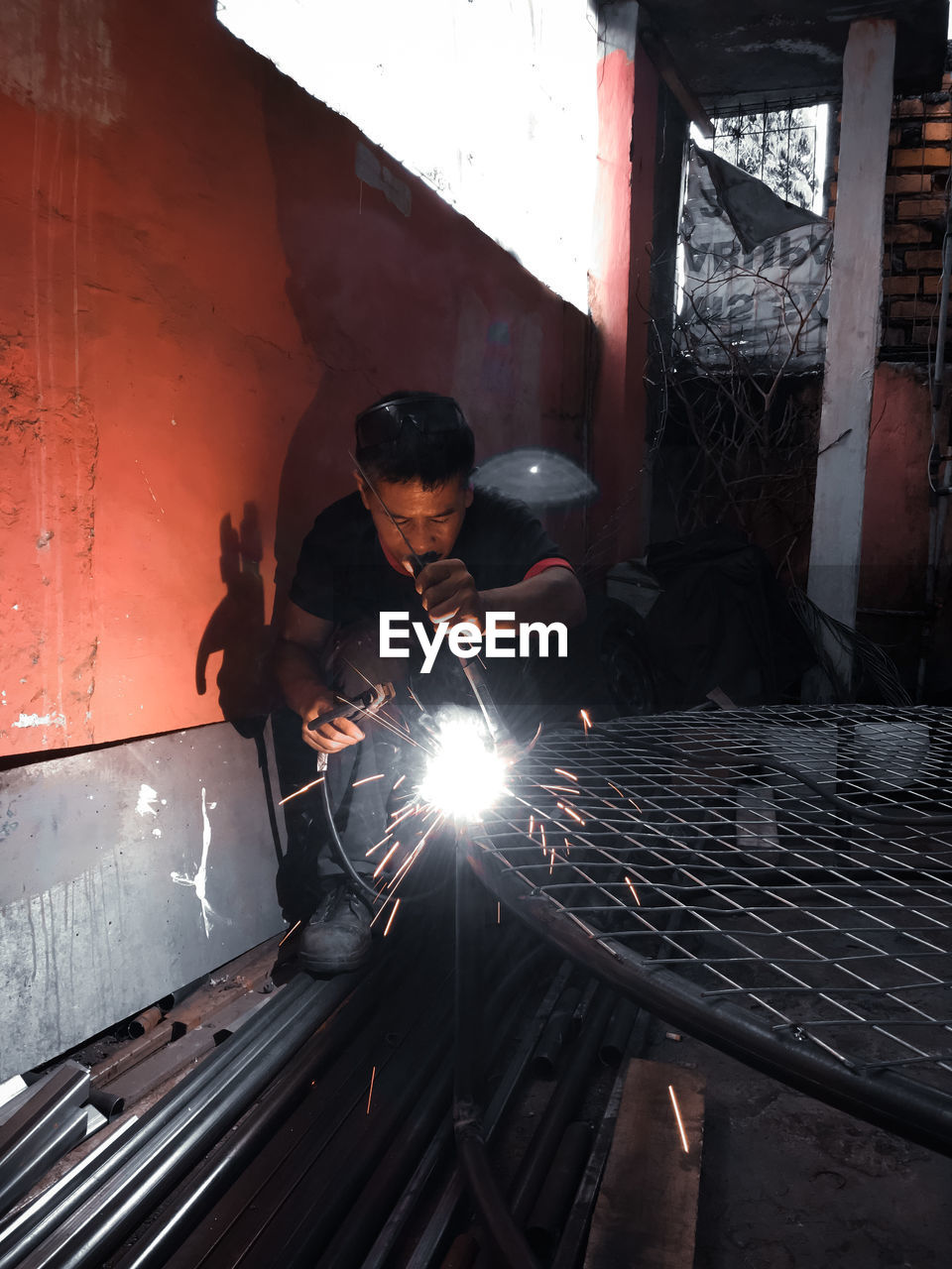 Welder working at factory