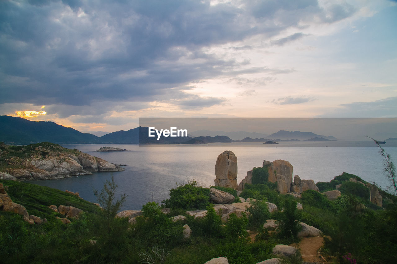 Scenic view of bay against sky