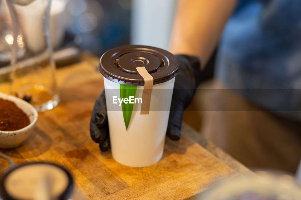 High angle view of coffee cup on table