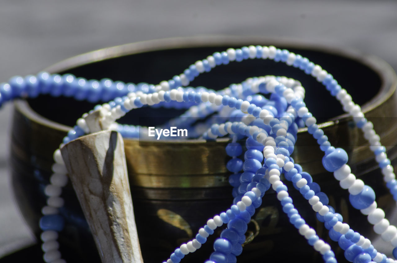 blue, rope, jewellery, close-up, no people, fashion accessory, knot, bracelet, focus on foreground, necklace, art, selective focus, tied knot, chain, nature