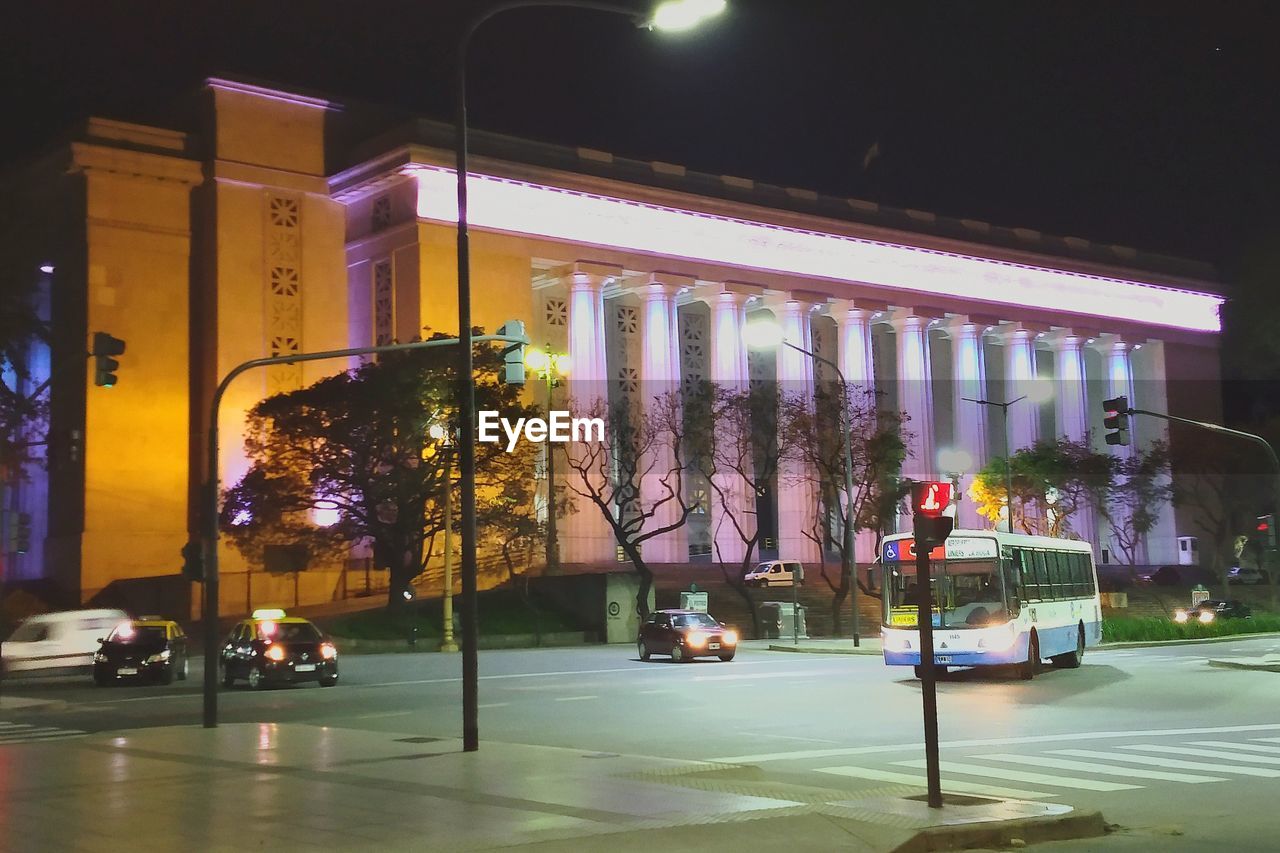 ILLUMINATED STREET LIGHTS AT NIGHT