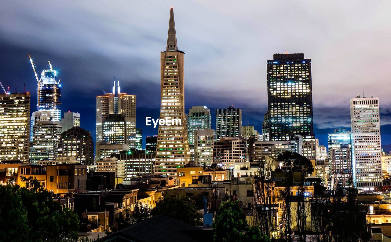 Illuminated cityscape at night