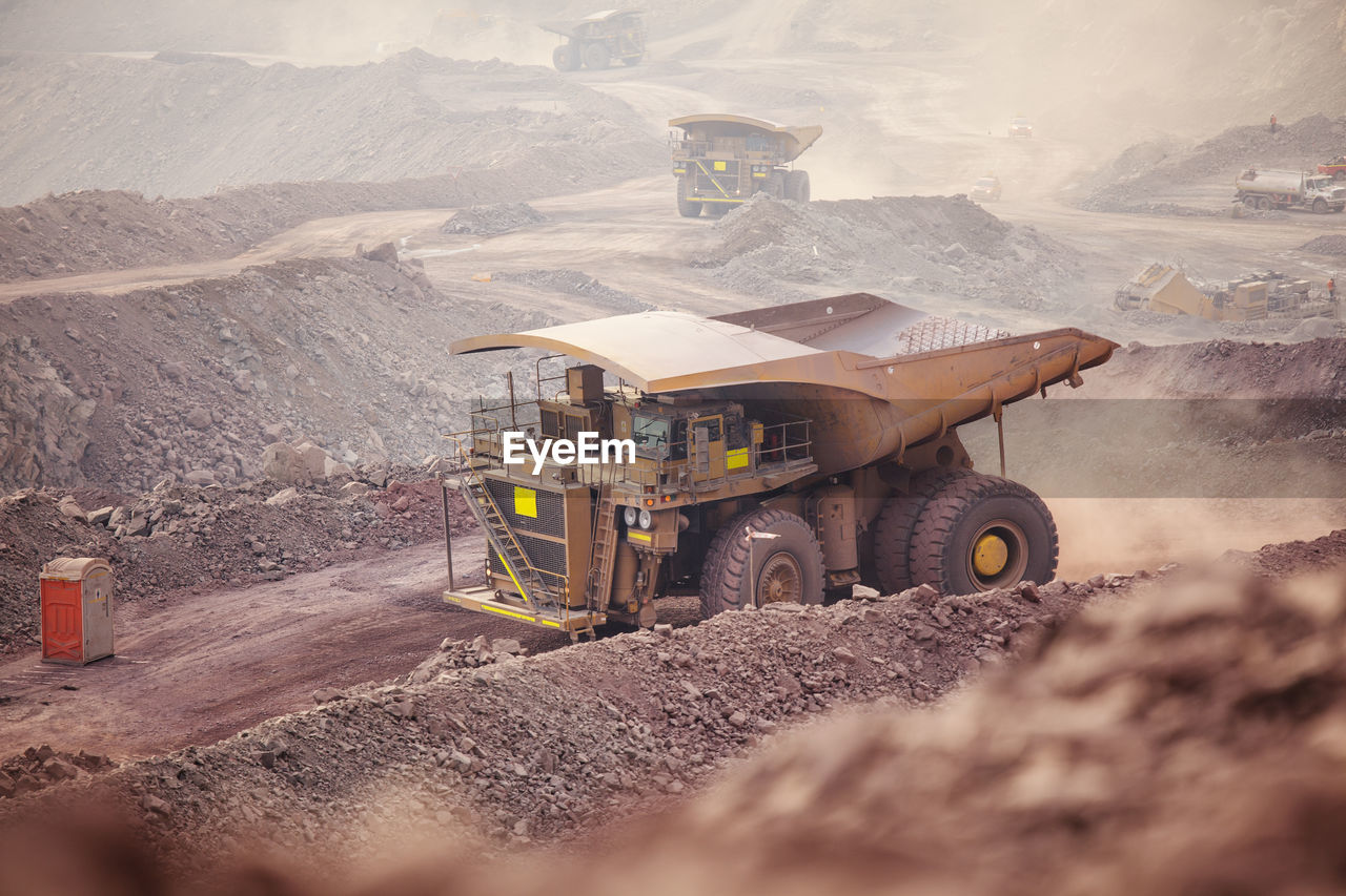 Mining activity, mining dump truck, high angle view of truck working on field