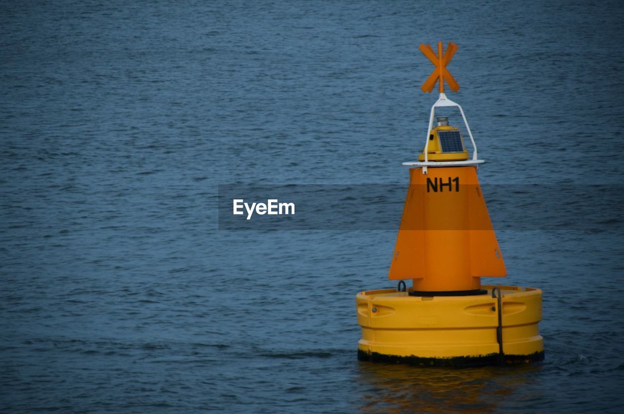 Boat in sea against blue sky