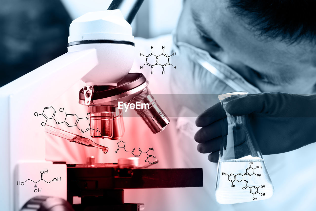 Digital composite image of scientist doing experiment with chemistry formulas