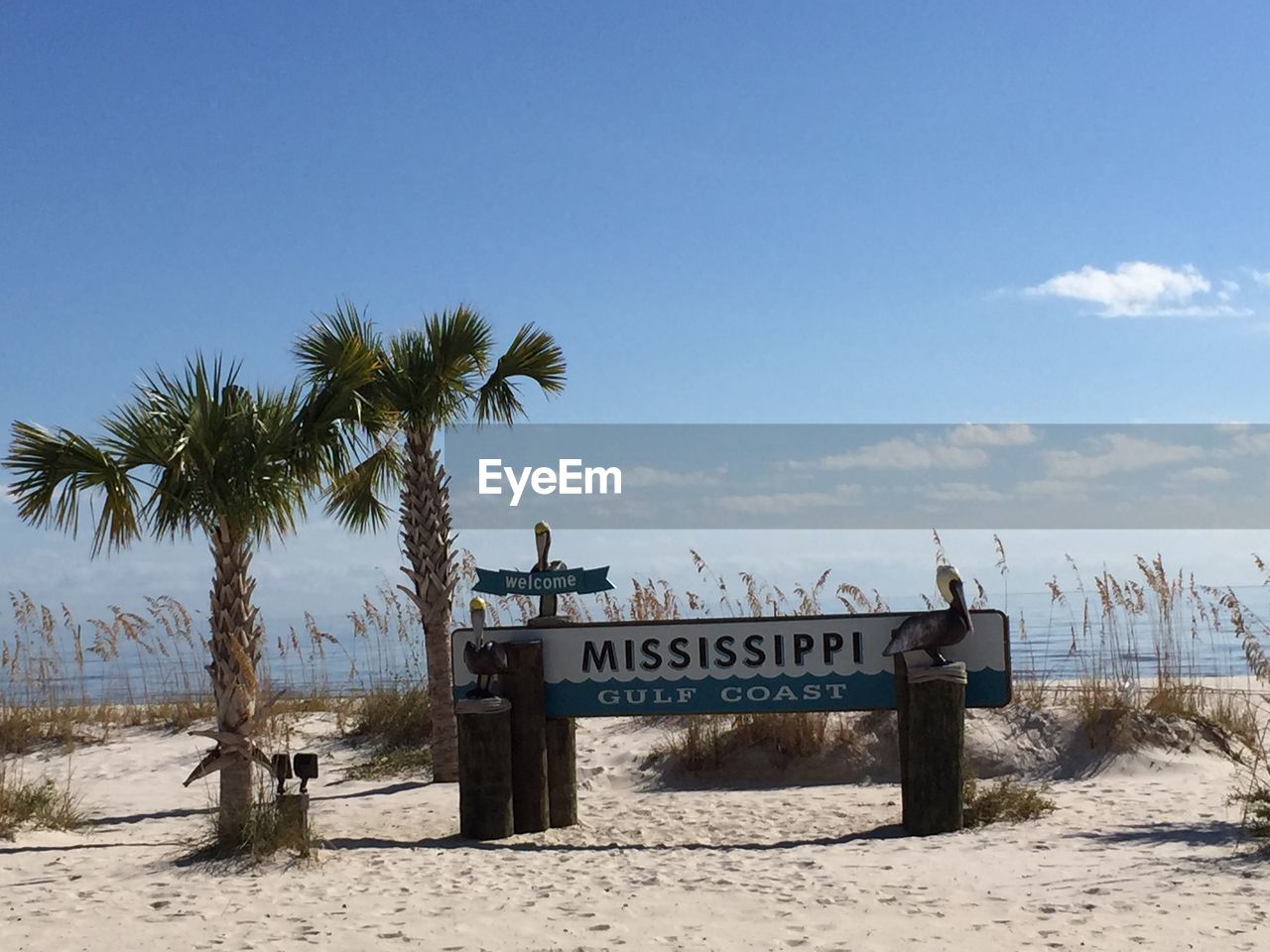 Welcome sign to mississippi on beach