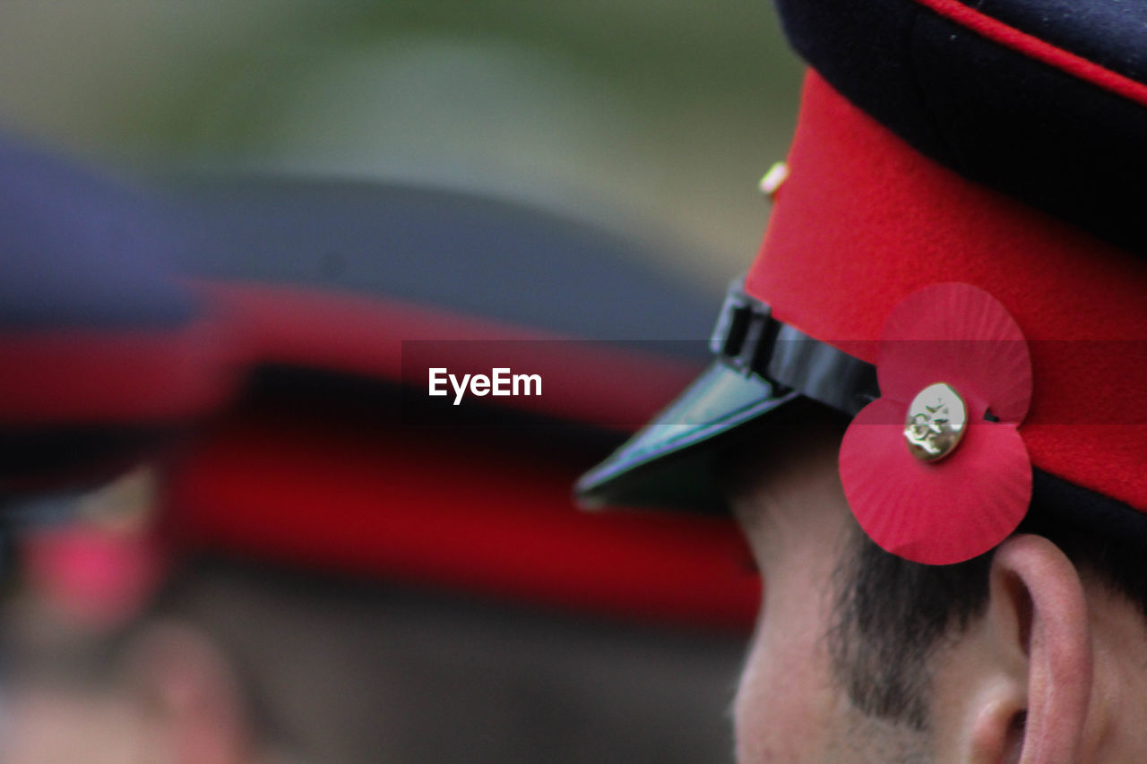 Cropped image of british army soldier wearing cap