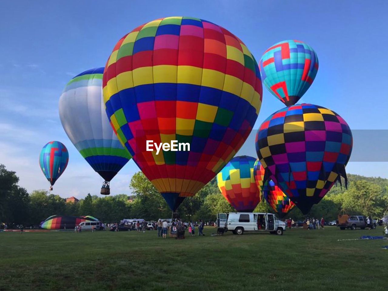 Multi colored hot air balloon against sky