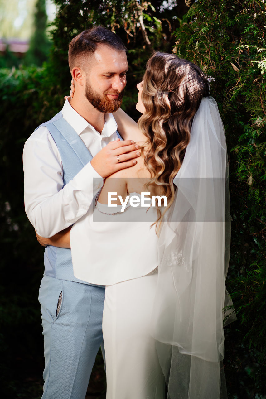 Young couple standing outdoors