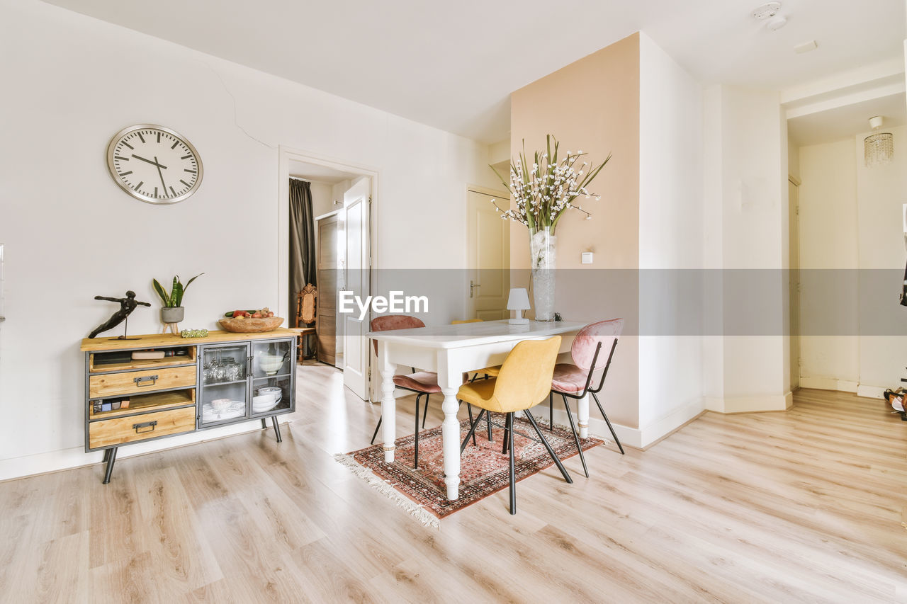 empty chairs and table in room