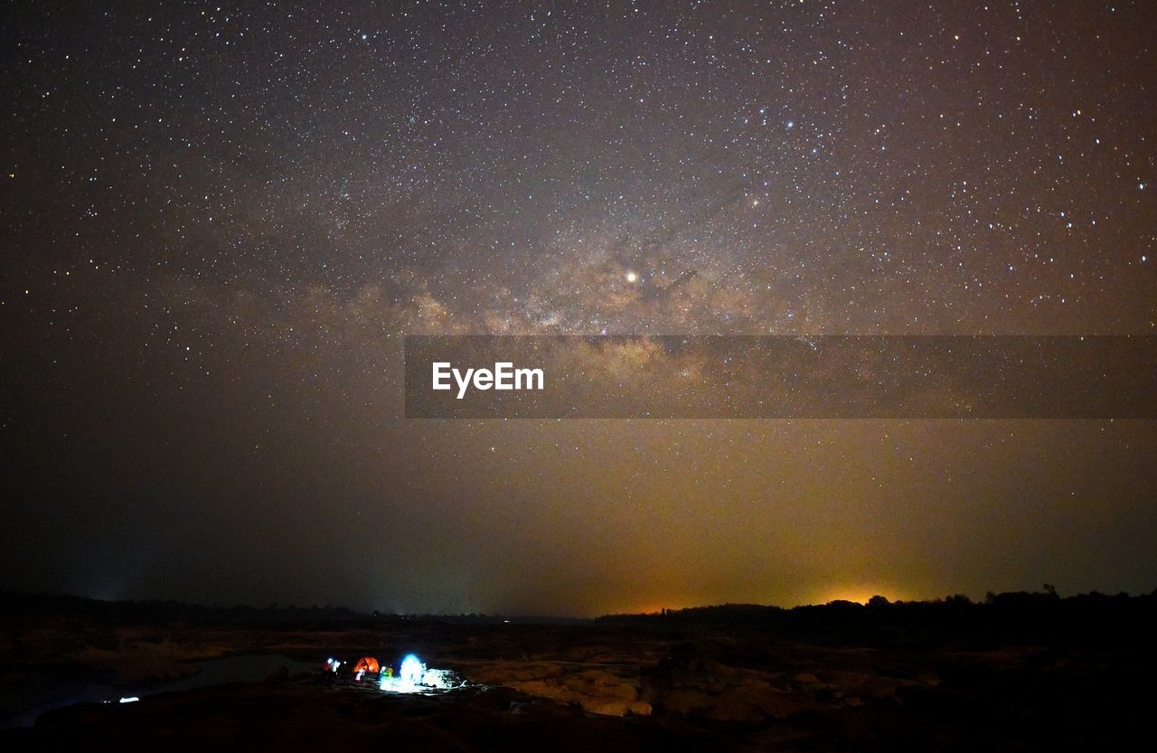 Scenic view of star field against sky at night