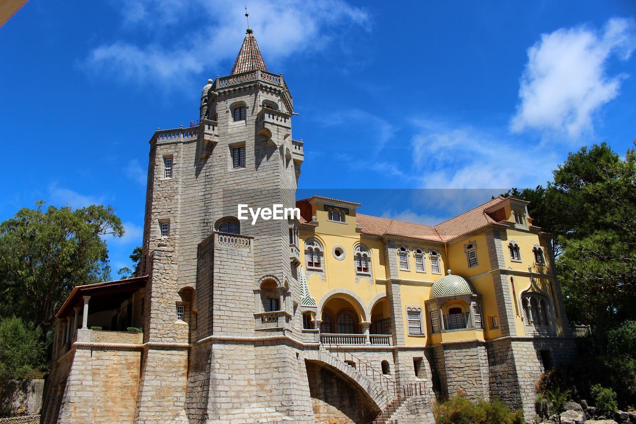 Low angle view of museu condes de castro guimaraes against sky