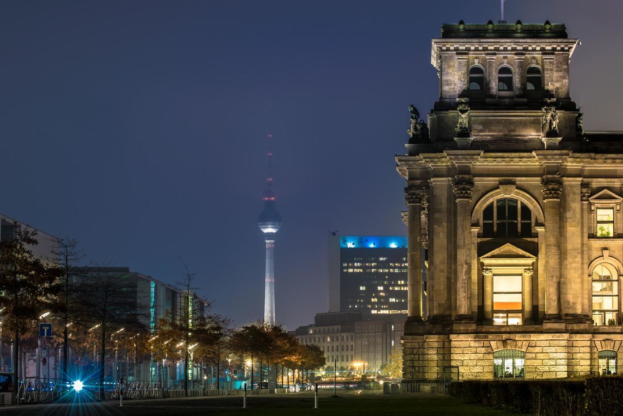 View of city lit up at night