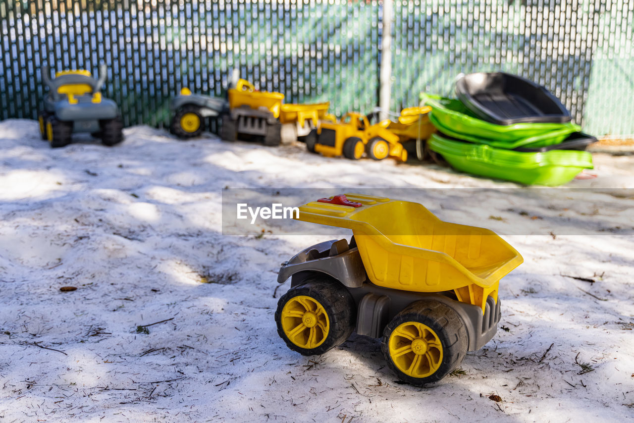 TOY CAR ON SNOW COVERED LAND