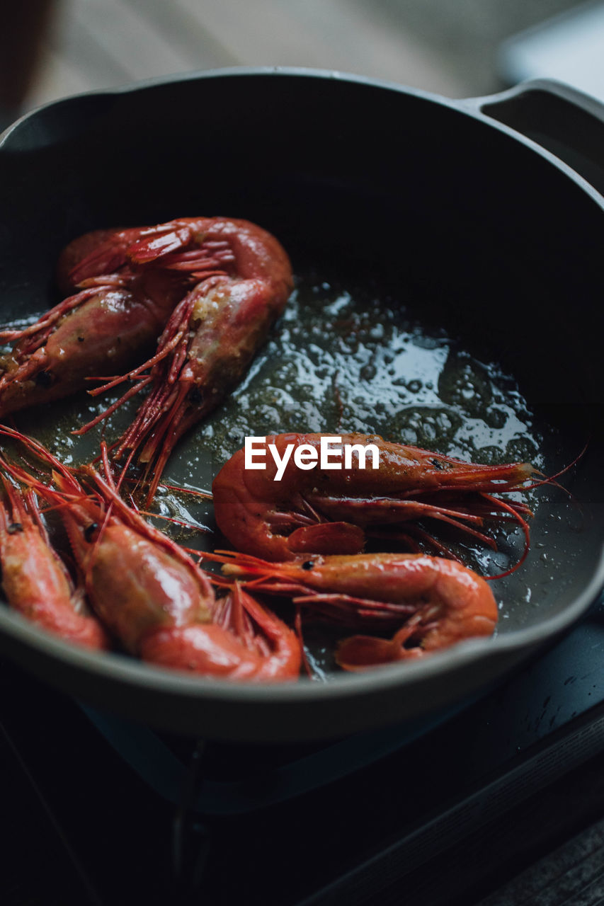 Spot prawns shrimp seafood in butter garlic parsley camping outdoors