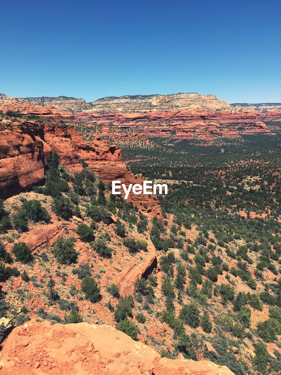 Scenic view of rocky mountains against clear sky