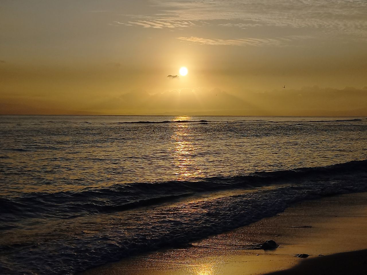 sea, water, sky, sunset, beauty in nature, land, beach, scenics - nature, horizon over water, tranquility, ocean, nature, horizon, tranquil scene, sun, wave, sunlight, shore, idyllic, coast, cloud, reflection, dawn, body of water, wind wave, seascape, evening, motion, no people, sand, dramatic sky, outdoors, orange color, travel destinations, environment, travel, afterglow, vacation, trip, holiday, non-urban scene, silhouette, coastline, tourism