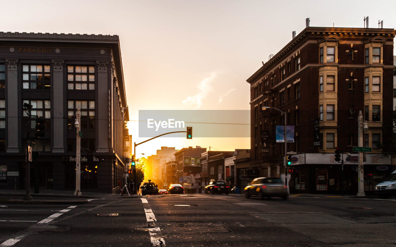 VIEW OF CITY STREET AT DUSK