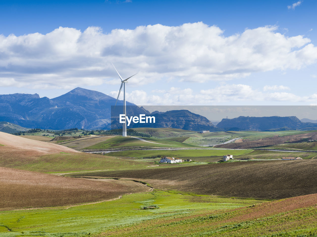 Windmill in a mountainous landscape, malaga, spain