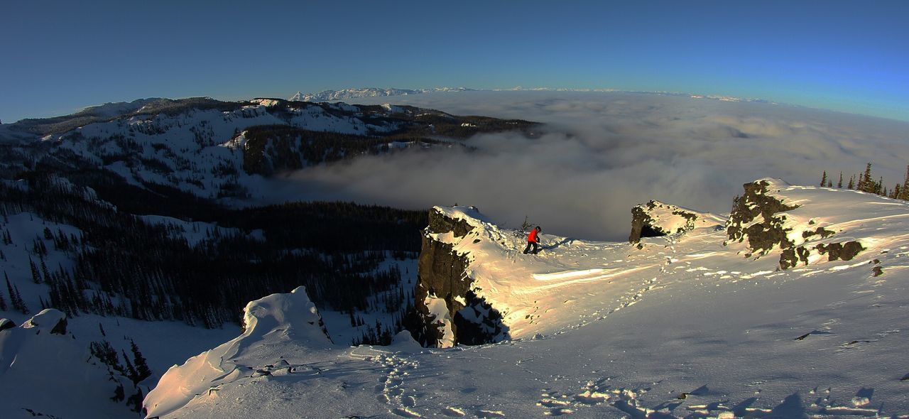 Scenic view of snow covered mountains