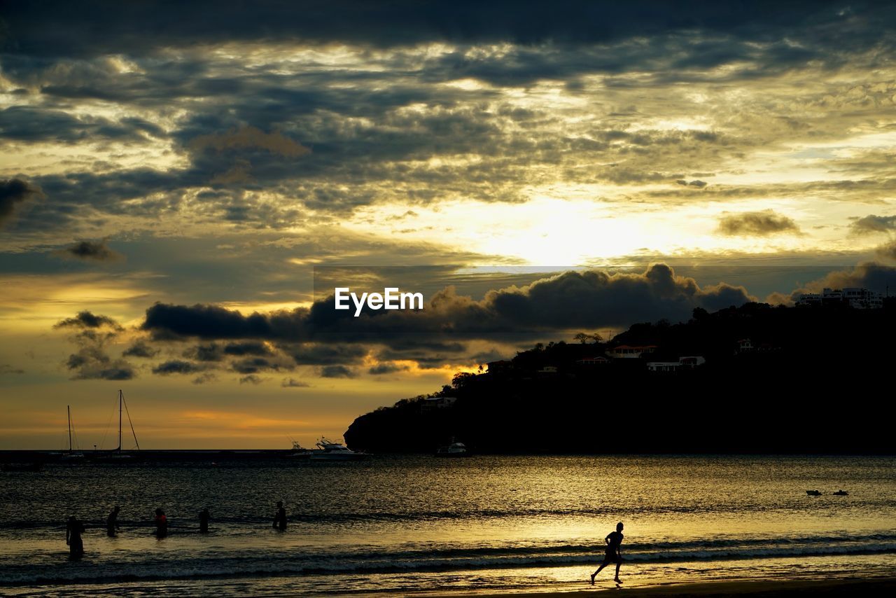 Silhouette of beach during sunset