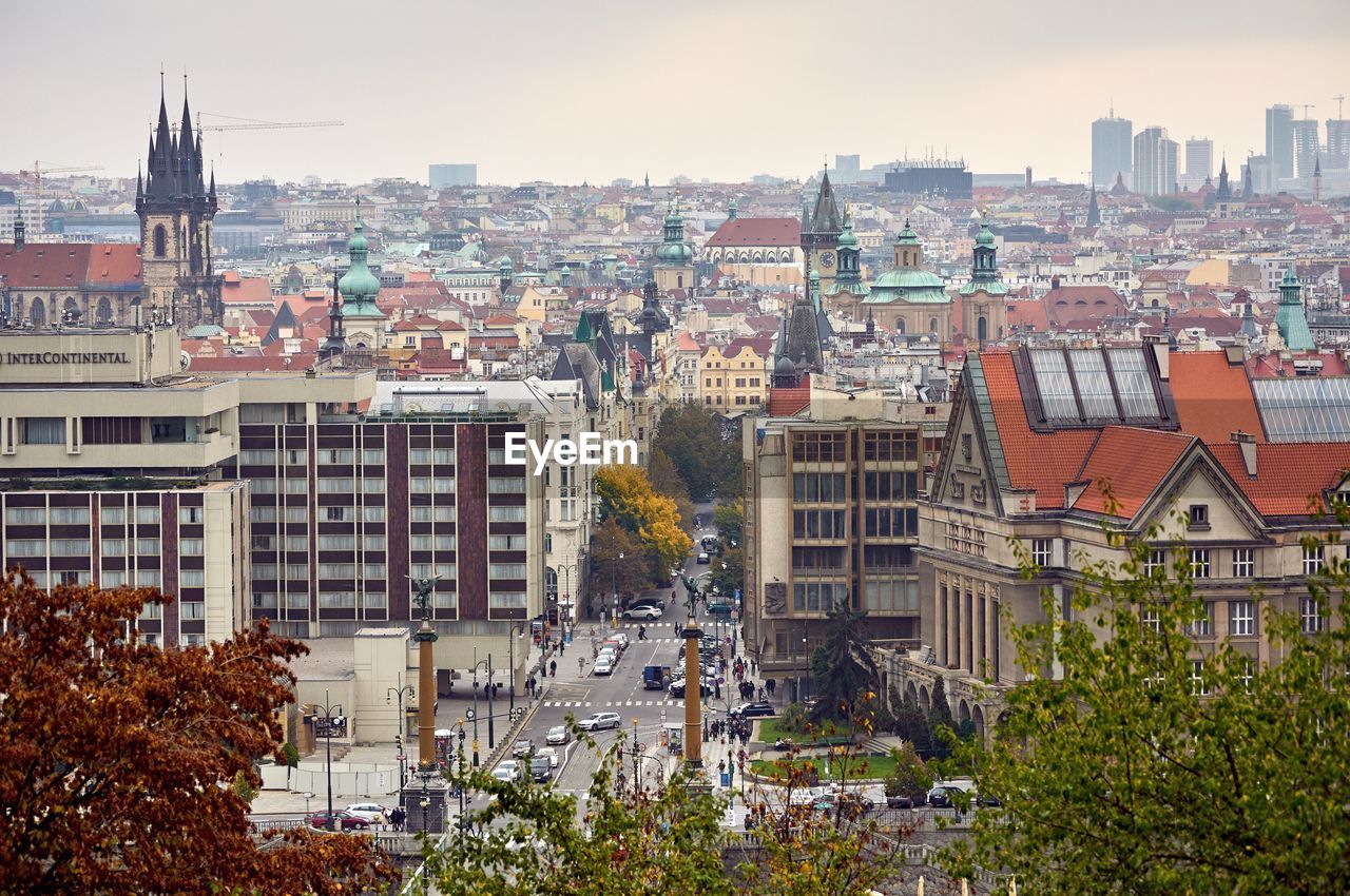 High angle view of buildings in city against sky