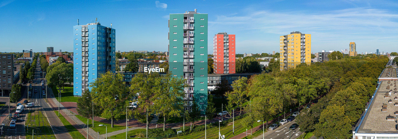 Aerial photo of 4 colorful apartment buildings in the hague south-west.