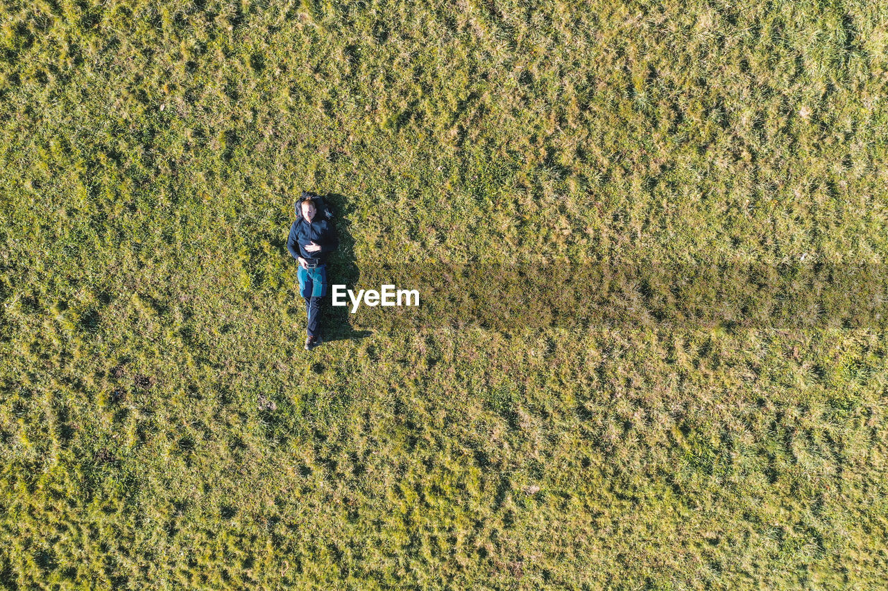 High angle view of people standing on land