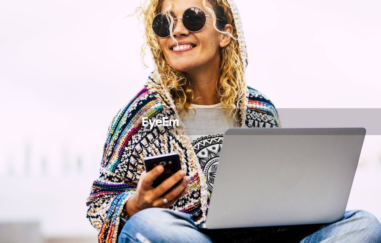 Young woman using mobile phone