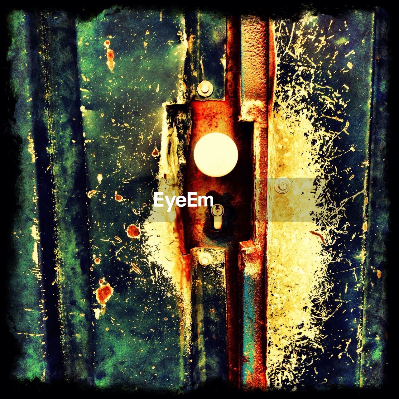 Full frame shot of door with rusty keyhole