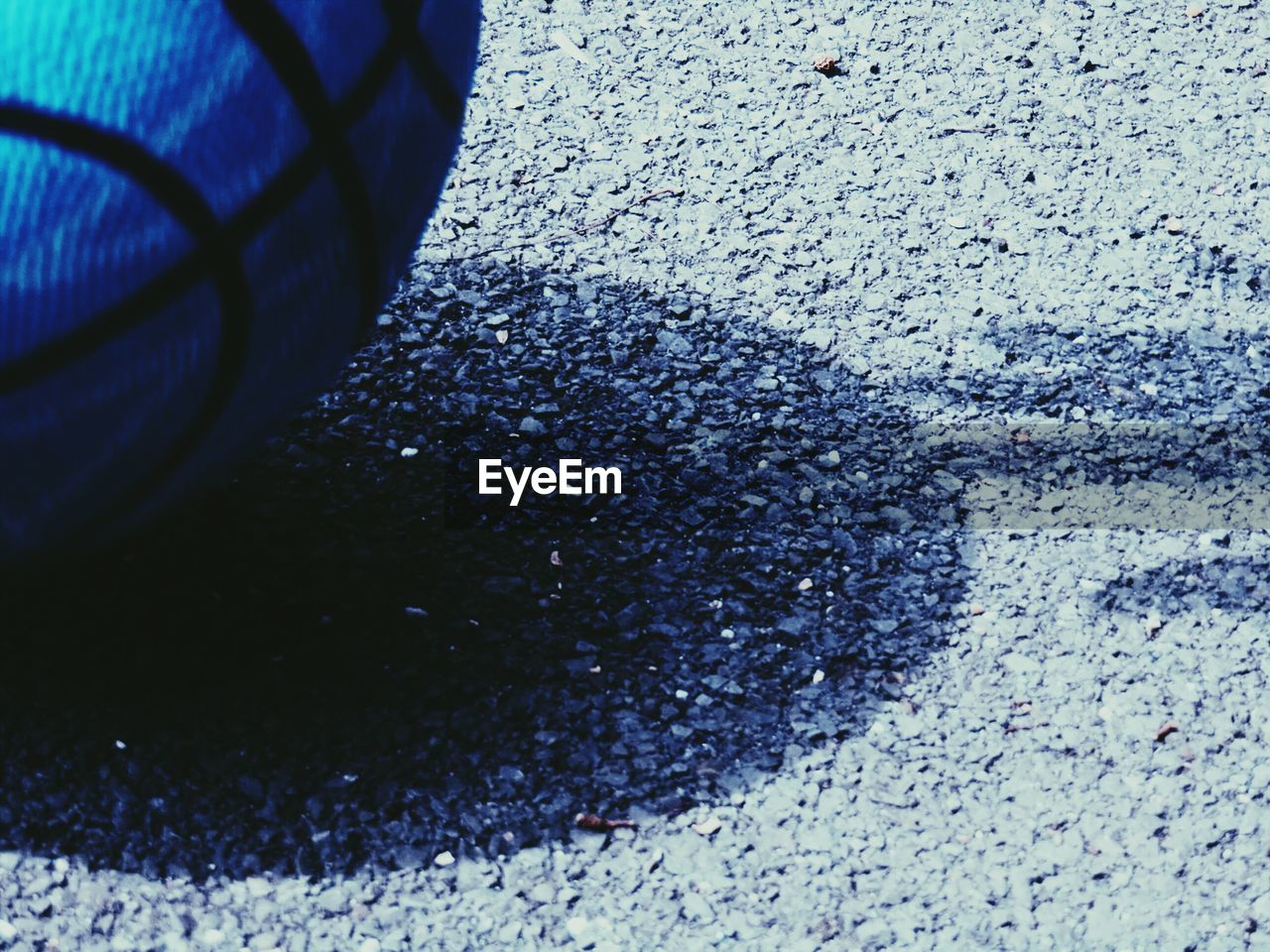 High angle view of basketball on street